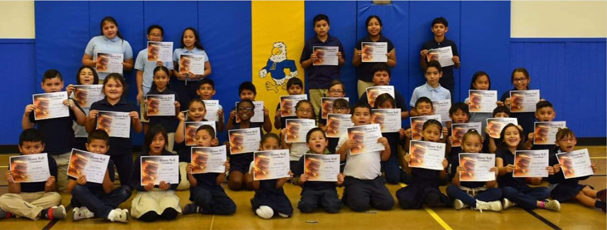 First grade students with teacher