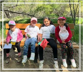 Students sitting on a bench