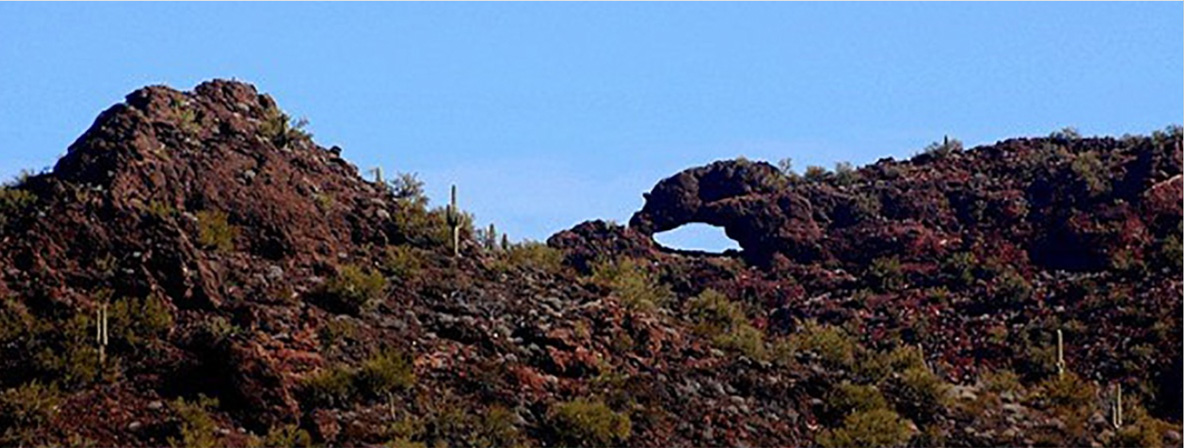 mountain with hole